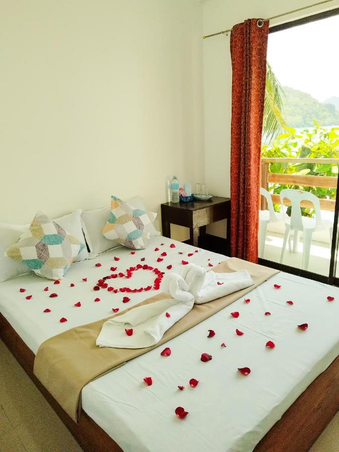 Joyful Guest House Ель-Нідо Екстер'єр фото